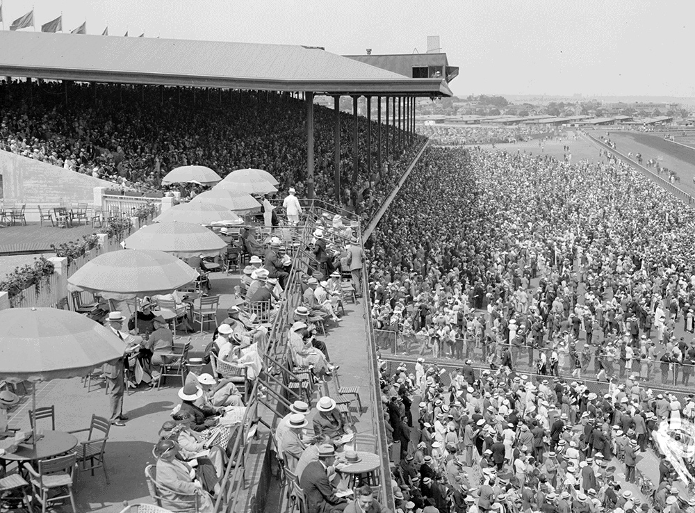 Crowd of spectators at Suffolk Downs former Thoroughbred race track in East Boston, MA.